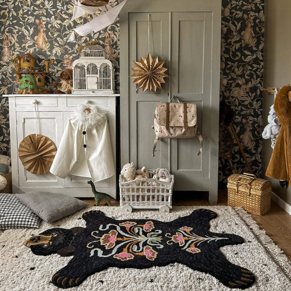 http://courthouseinteriors.com/cdn/shop/files/Black-Bear-Rug-Large-Lifestyle-4_600x.jpg?v=1692611896