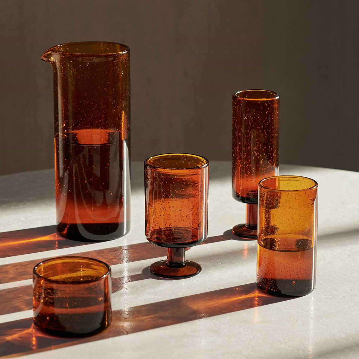 Oli Water Glass Tall Amber - ferm LIVING